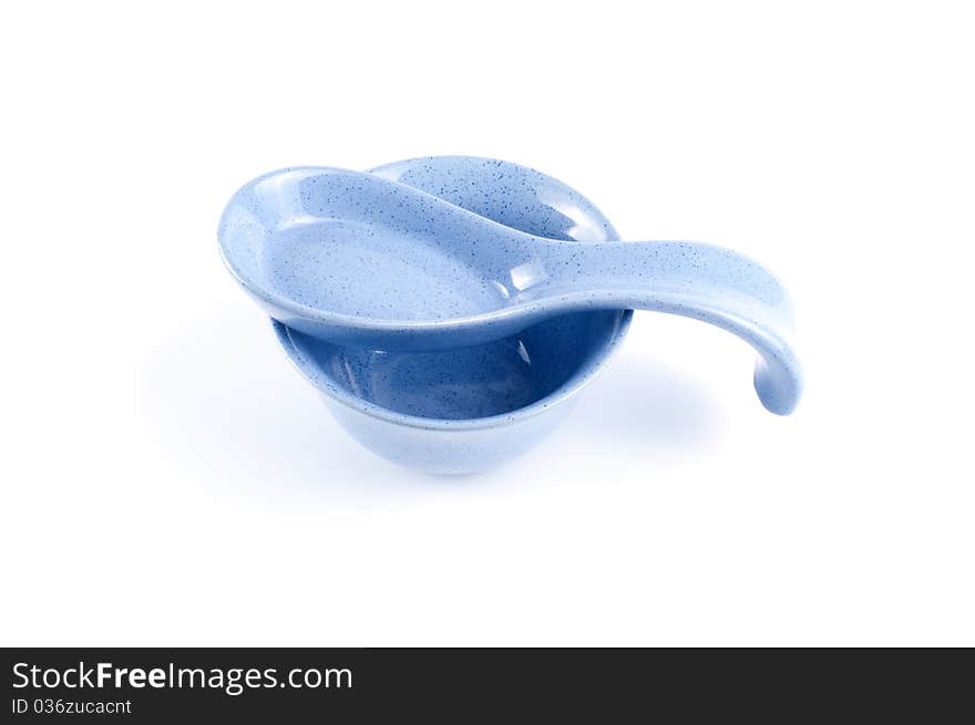 Ceramic ladle and bowl isolated on white background