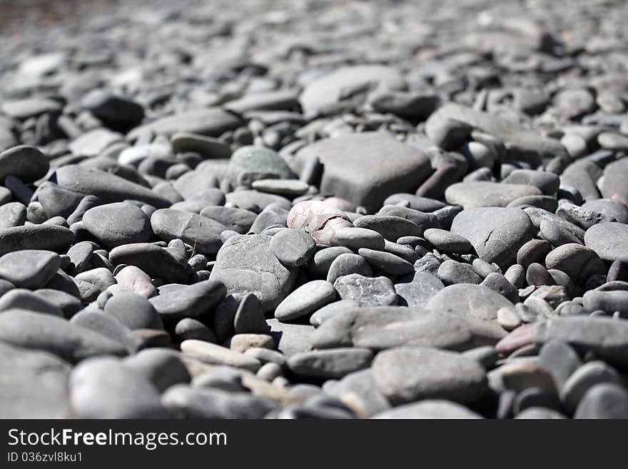 Mound of dry pebbles on the beach