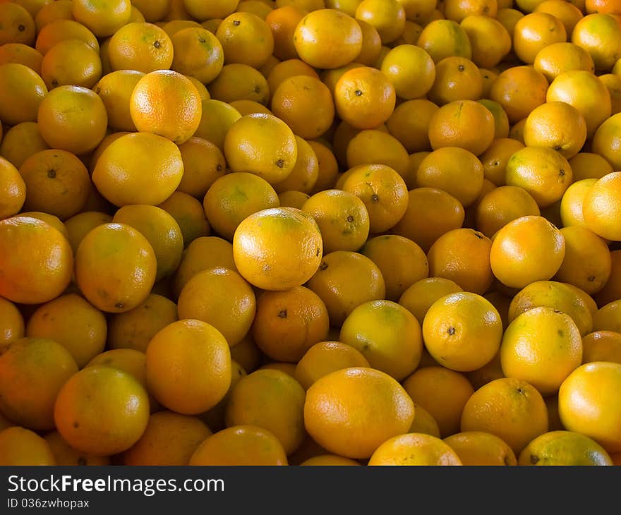 Fresh juicy oranges after the in the market supermarket wallpaper background. Fresh juicy oranges after the in the market supermarket wallpaper background