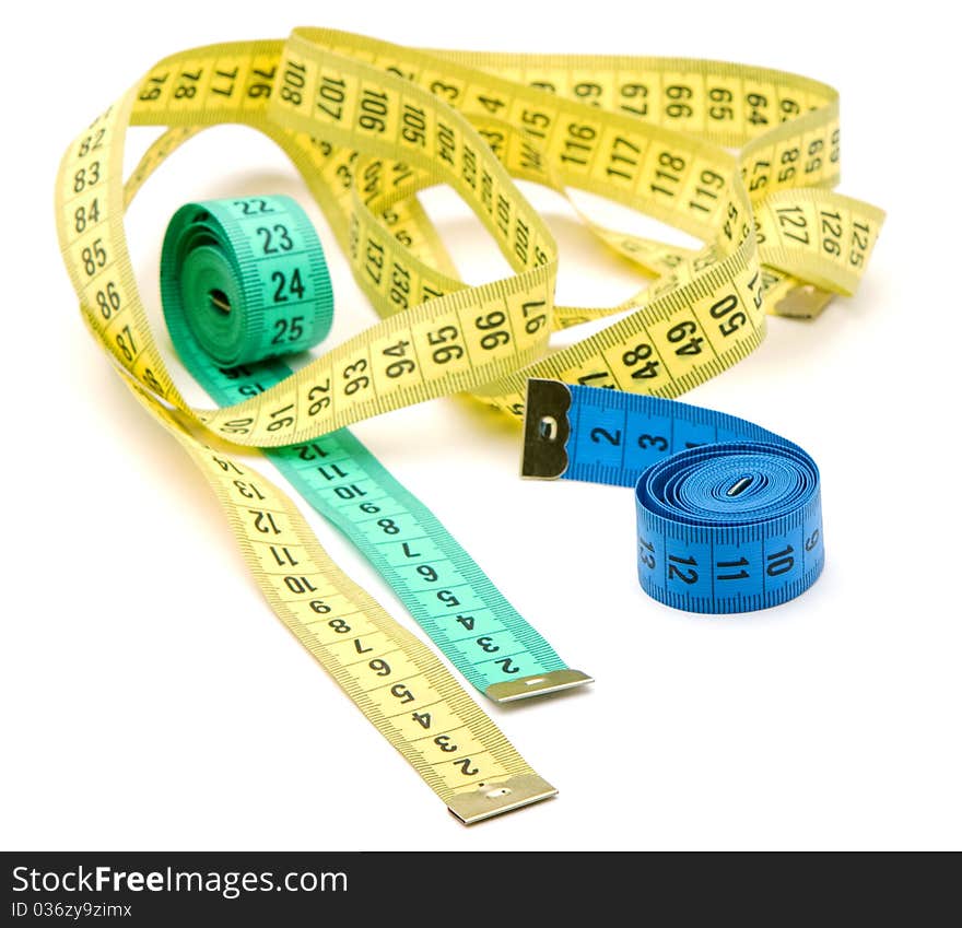 Three measuring tapes isolated over white background. Three measuring tapes isolated over white background