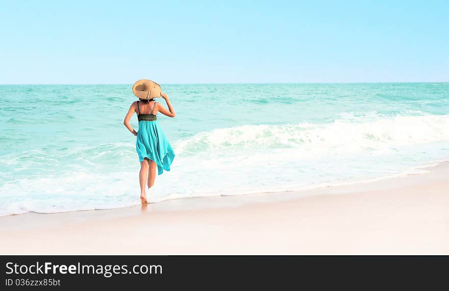 Beautiful beach in the Thailand, with a woman on the beach