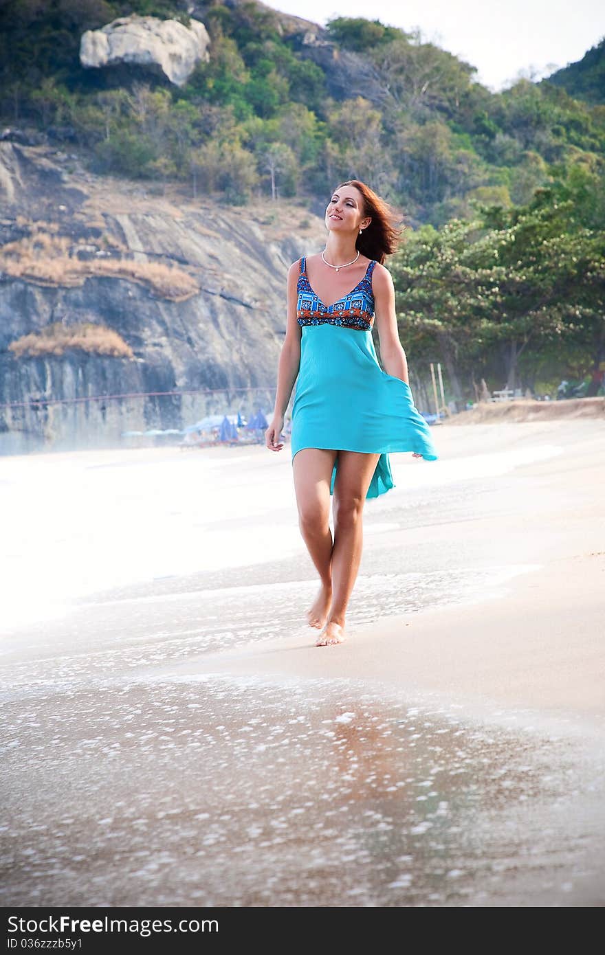 Beautiful beach in the Thailand, with a woman on the beach