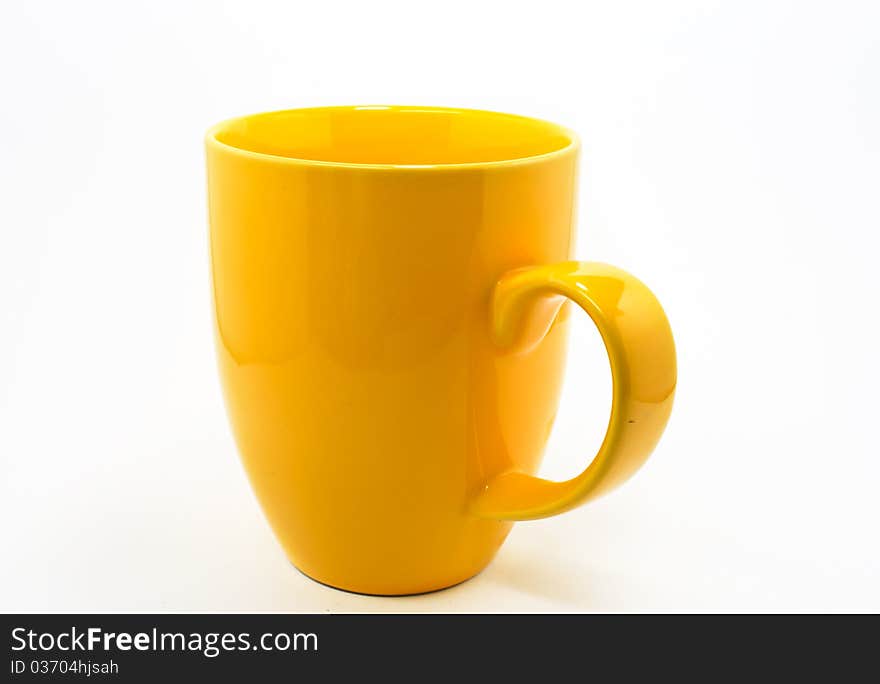 Yellow coffee cup isolated on white background. Yellow coffee cup isolated on white background