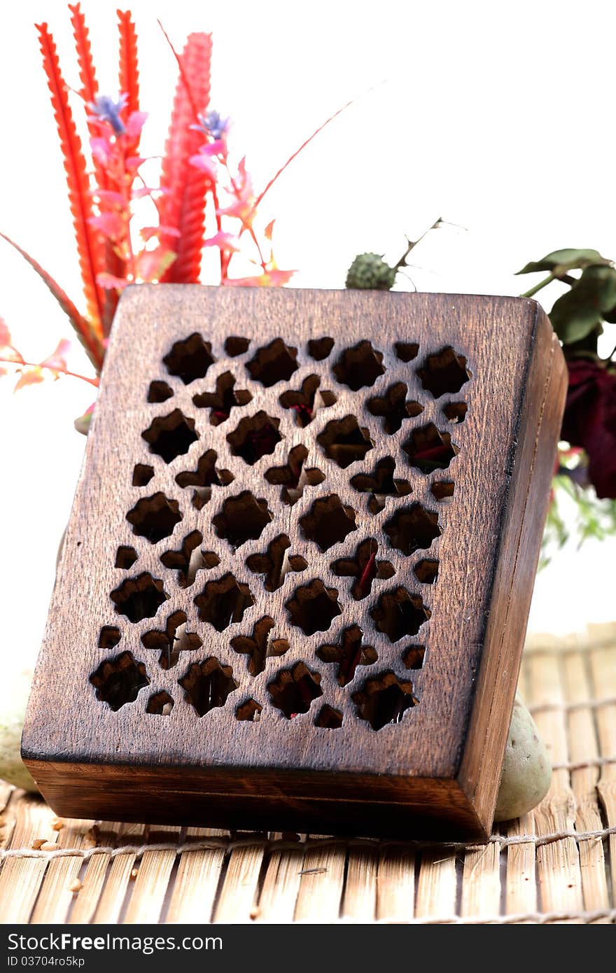 Antique wooden box with white background.