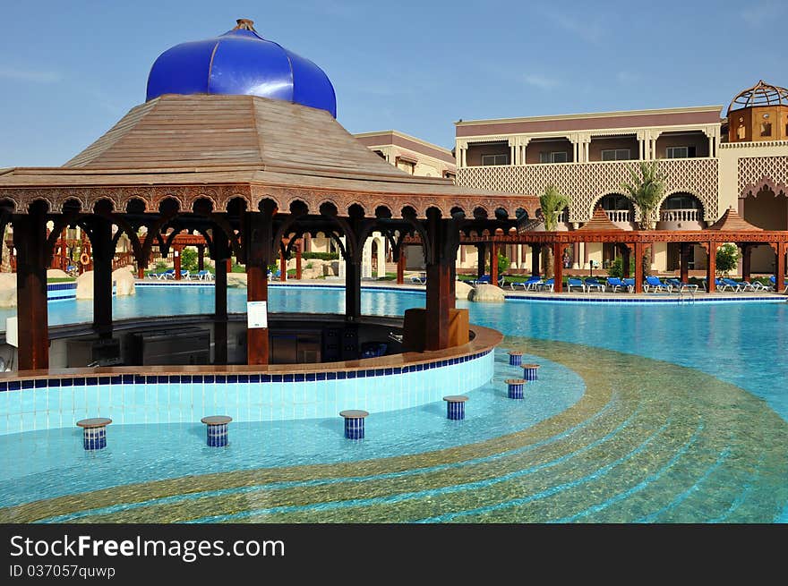 Blue pool with rocks in a seaside resort