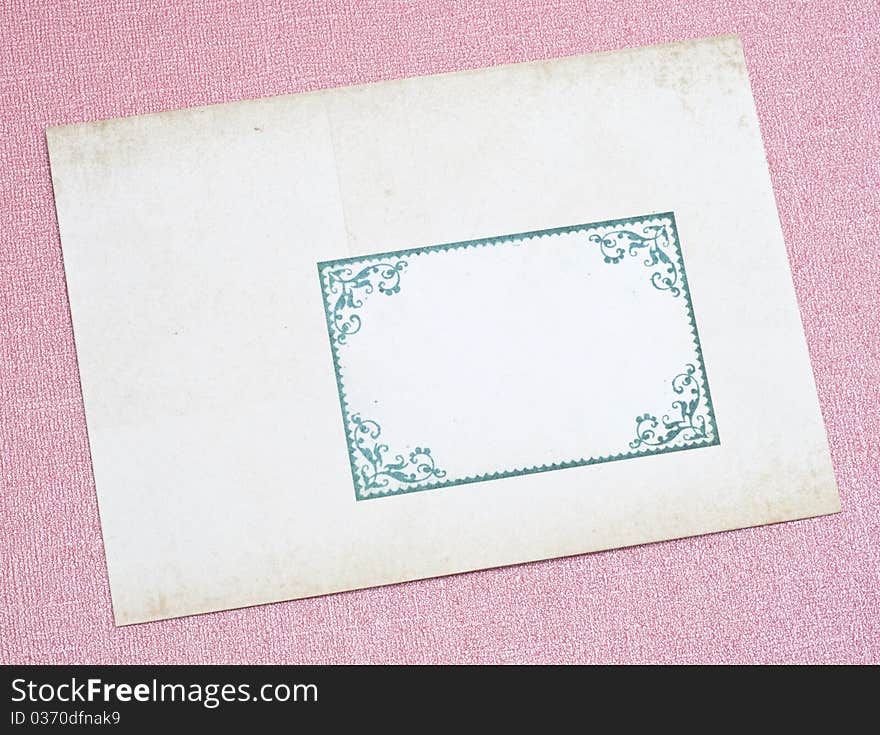 Ornate Old Envelope on a Pink Background.