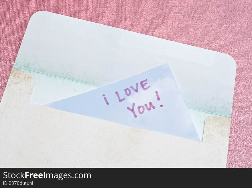 I Love You Concept with Handwritten Note in an Envelope.