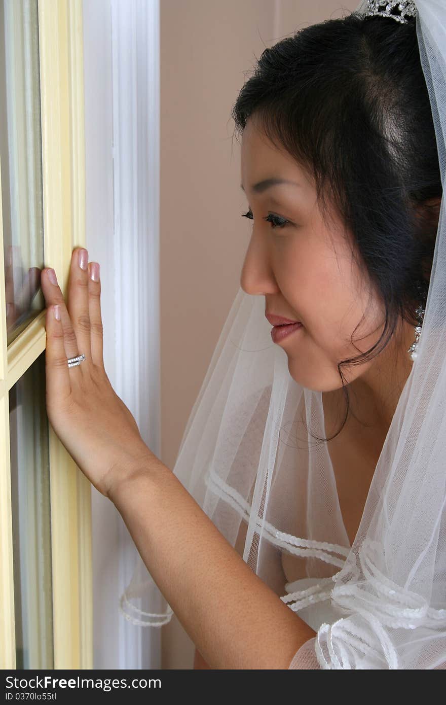 Beautiful Korean bride wearing a traditional wedding gown. Beautiful Korean bride wearing a traditional wedding gown