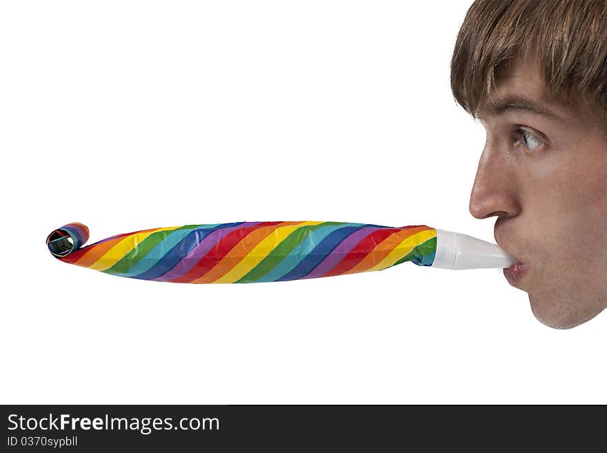 Man playing with party blowers. Isolated on white background