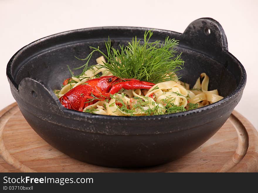 Plate of fine dining meal, tagliatelle, lobster