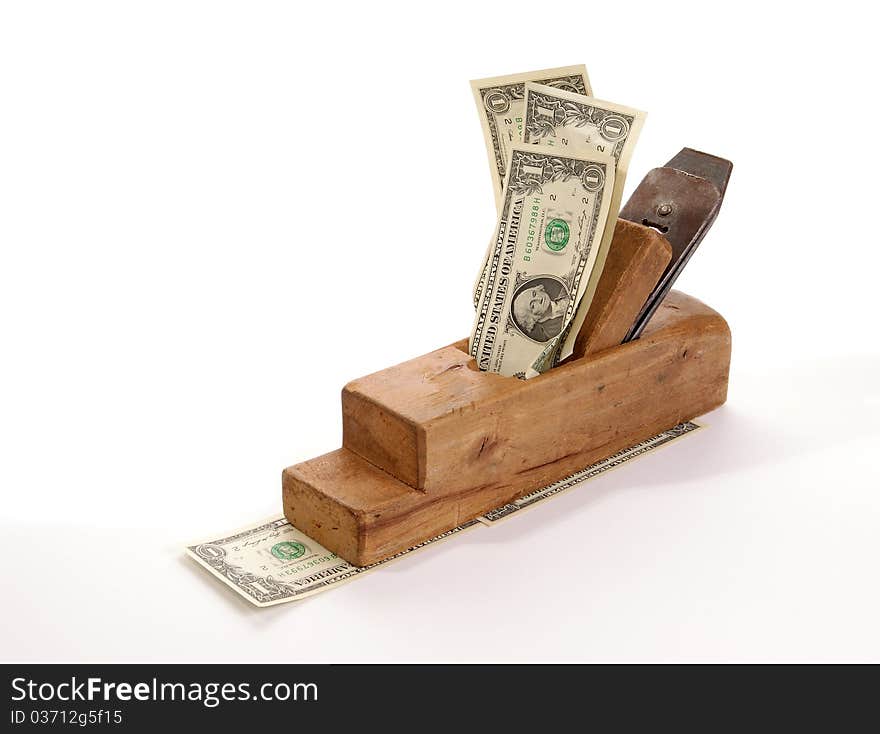 Work and earn. Old wood the planer and paper banknotes on a white background. Work and earn. Old wood the planer and paper banknotes on a white background