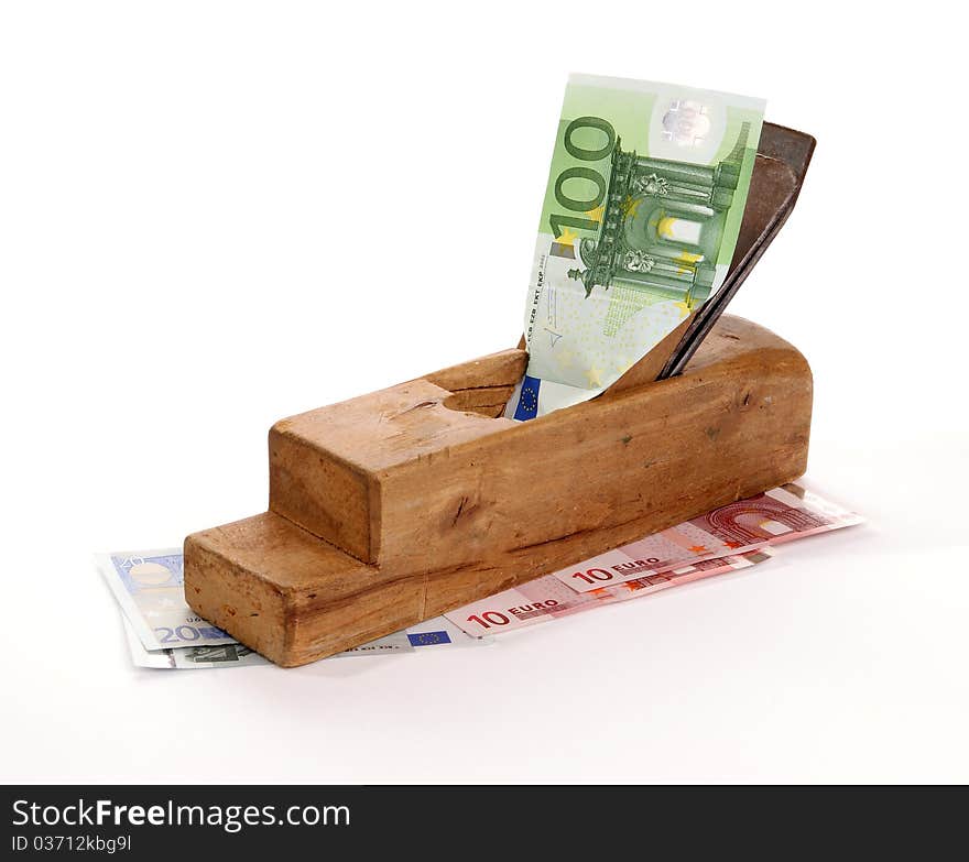 Work and earn. Old wood the planer and banknotes