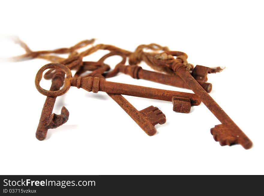 It photographs of first plane of group of old and rusty keys. It photographs of first plane of group of old and rusty keys