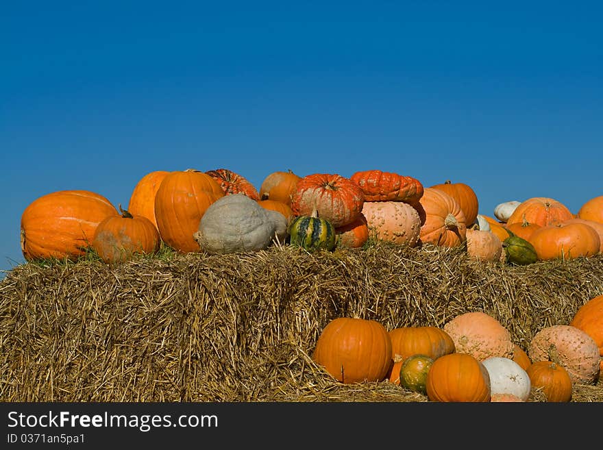 Pumpkins on bales of straw (hay)