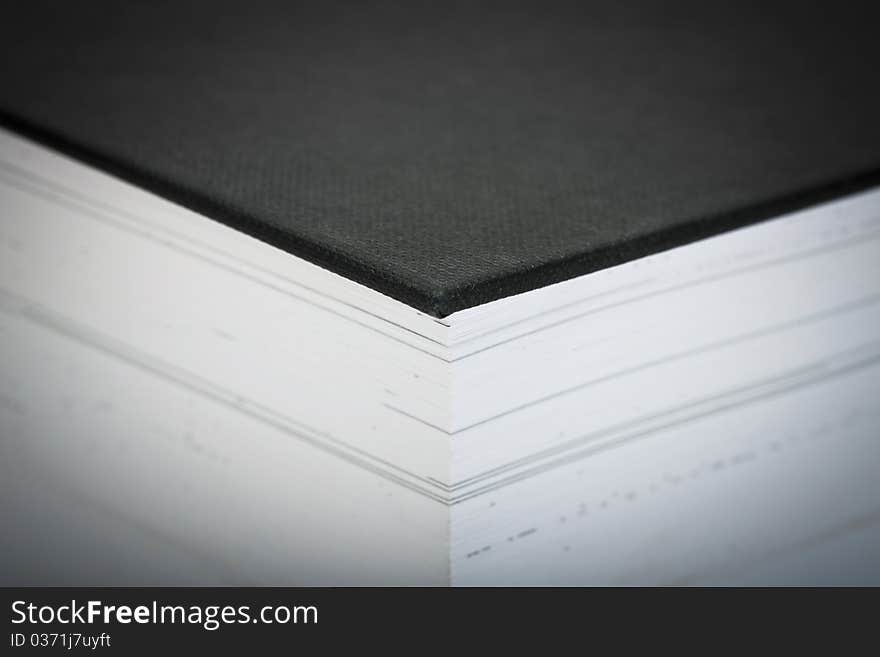 Extreme close-up of a thick book - selective focus. Extreme close-up of a thick book - selective focus