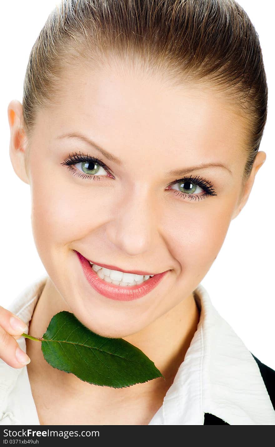 Young girl with a small, green leaf. isolated