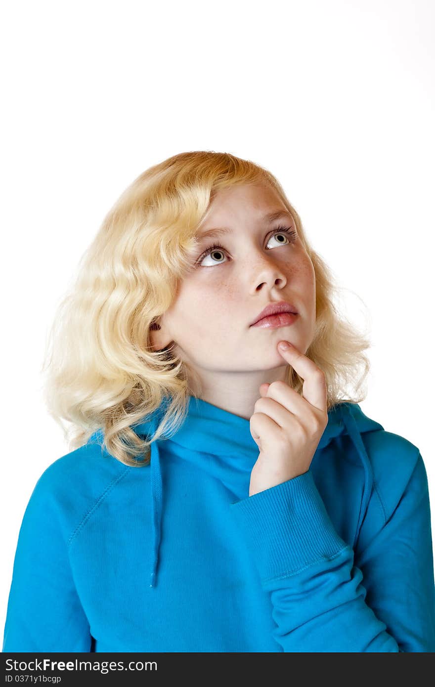 Young beautiful girl looks contemplative in the air. Isolated on white background. Young beautiful girl looks contemplative in the air. Isolated on white background.