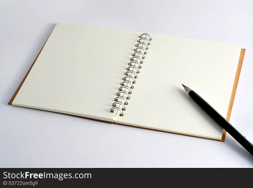 Blank notebook with pencil, You can write anything on it.