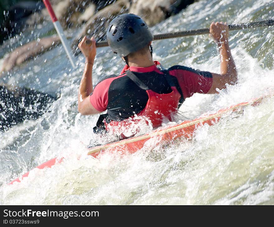 An active kayaker on the rough water