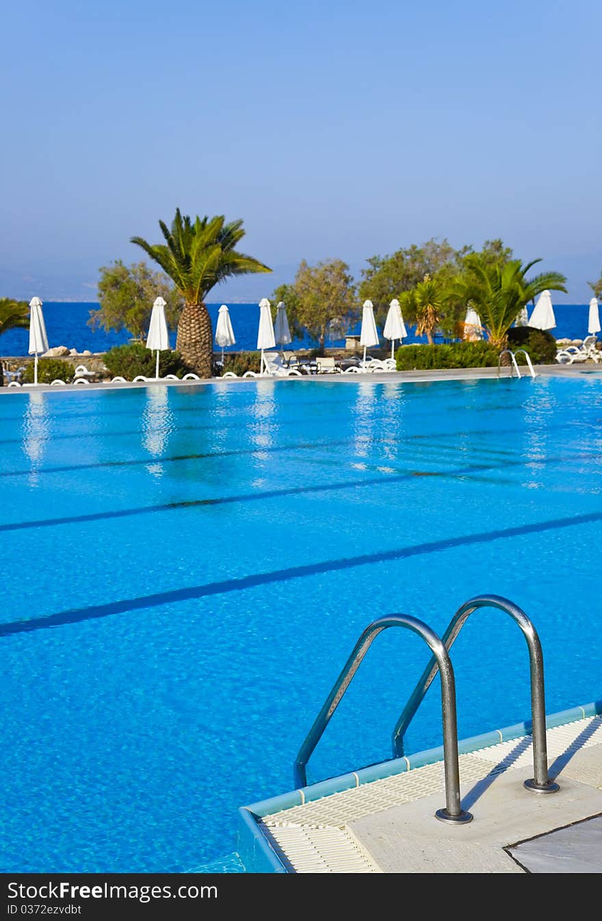 Water pool and stairs - vacation background