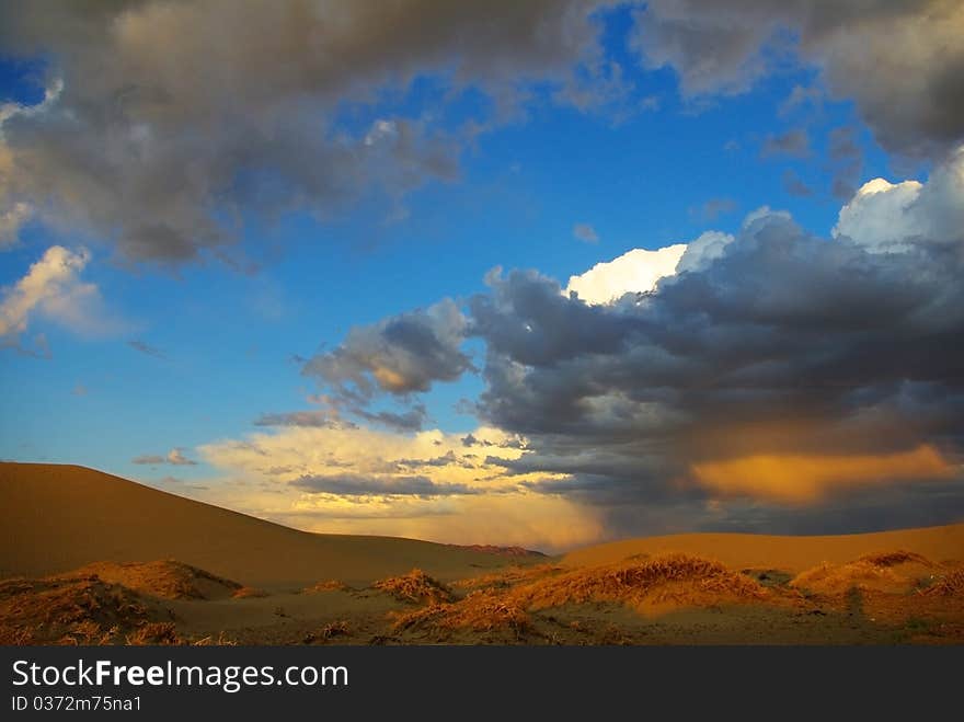 Clouds colored with sun rays. Clouds colored with sun rays