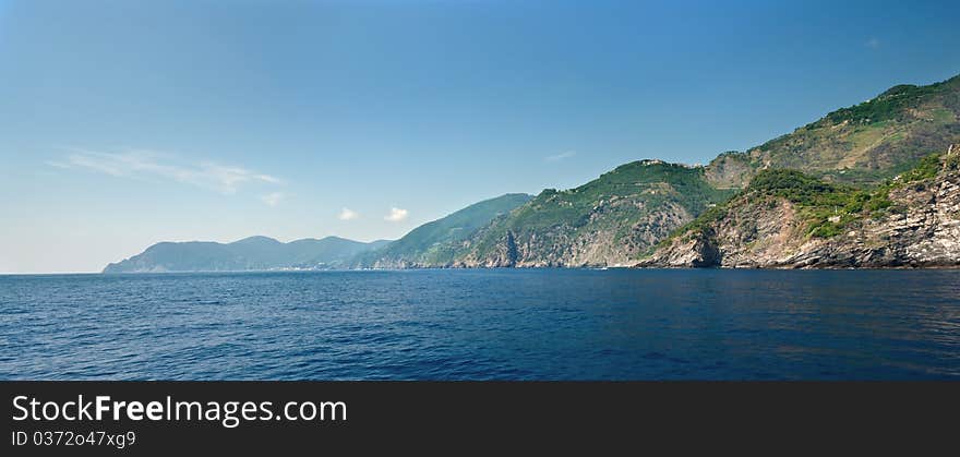 Panoramic view of the mountains at the seacoast. Panoramic view of the mountains at the seacoast