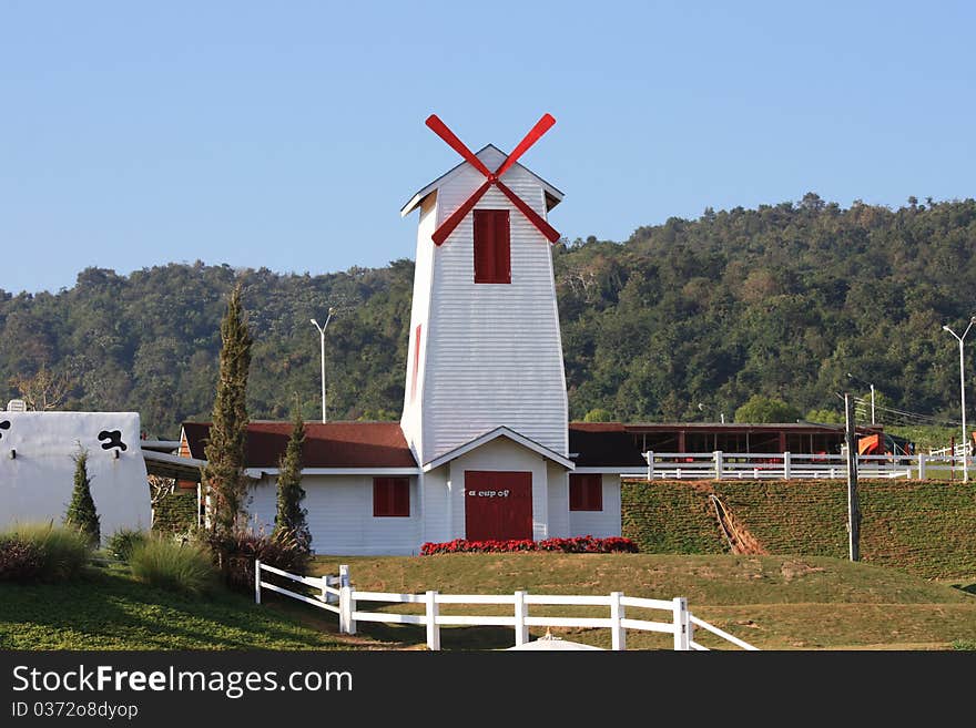 Windmill on a white building