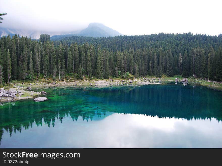 Italy, Trentino, lake with reflections. Italy, Trentino, lake with reflections