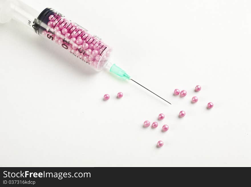 Syringe Filled With Pink Candy