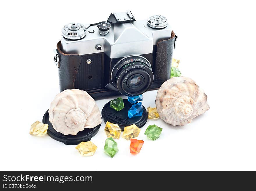 Black retro analog camera with lens. Isolated on white background