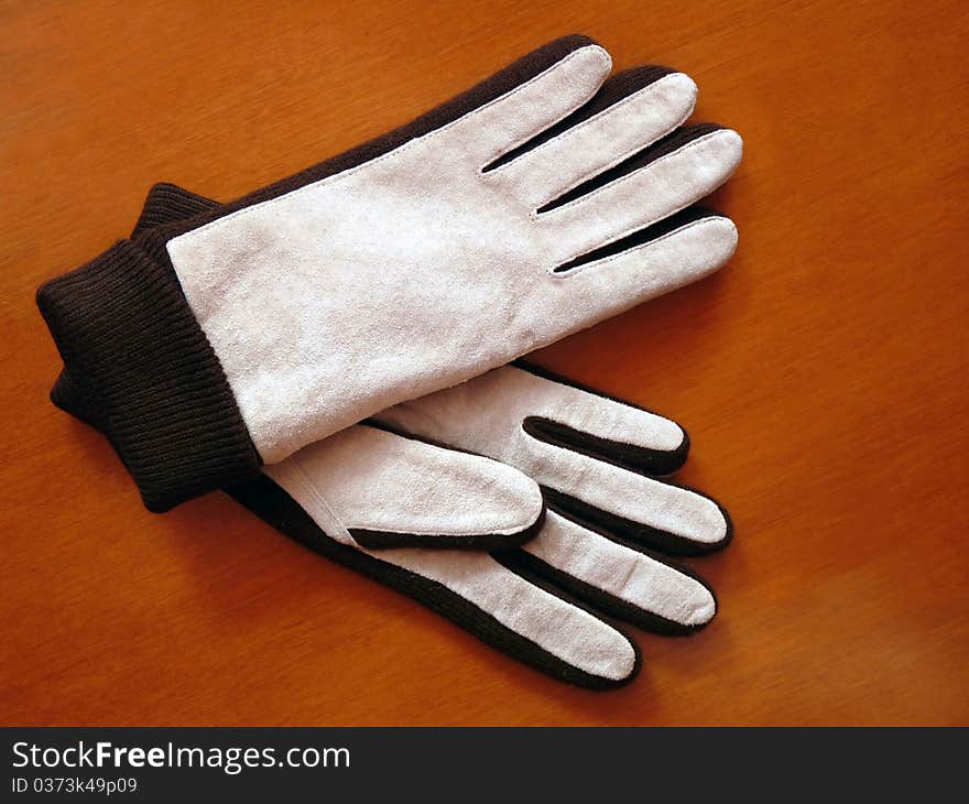 Stylish white women's suede gloves. Stylish white women's suede gloves