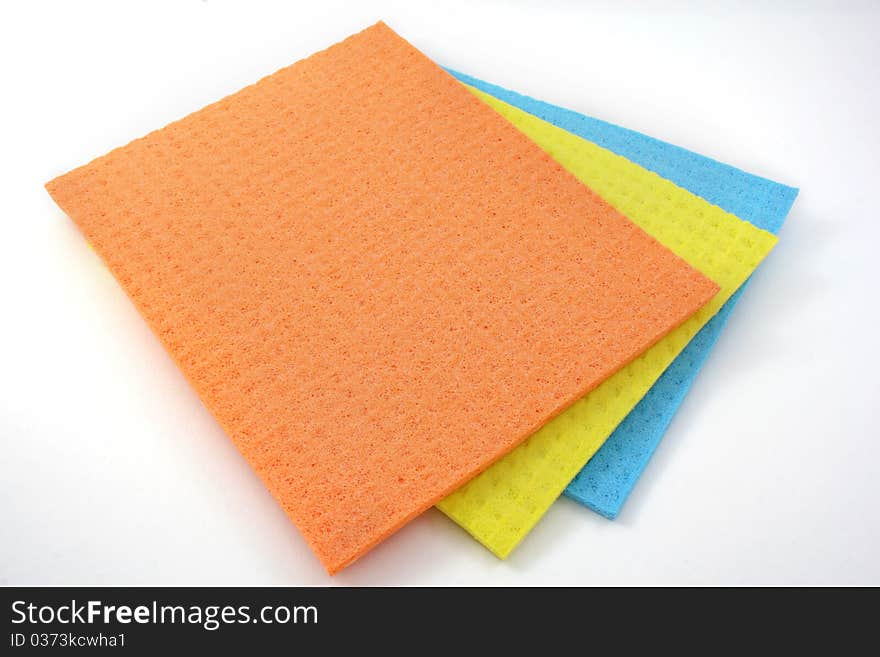 Colorful cloth for cleaning on a white background. Colorful cloth for cleaning on a white background