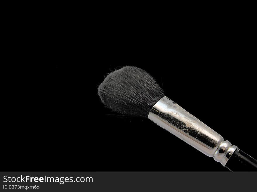 The makeup brush and powder