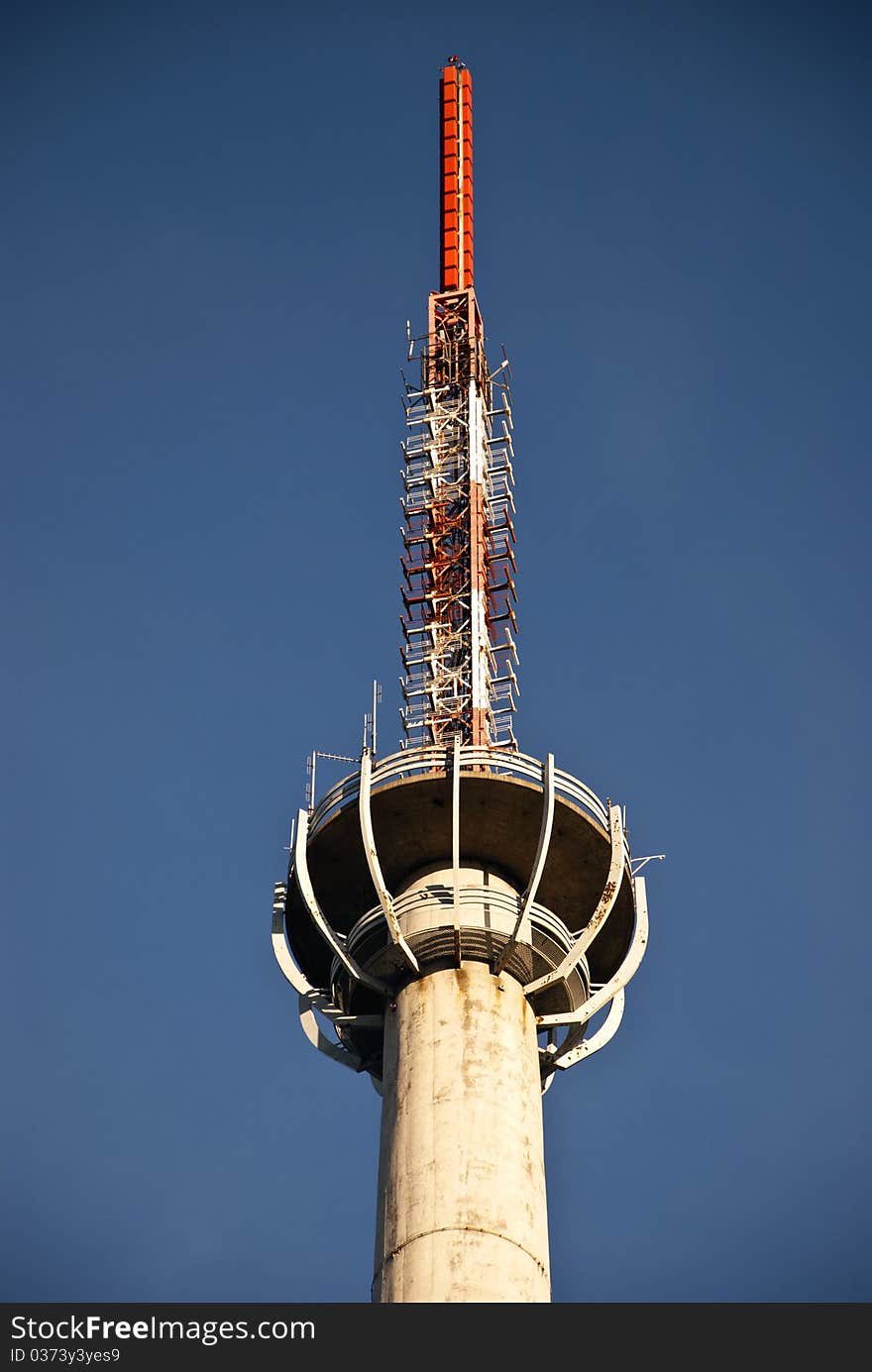 Huge communication antenna tower against  sky. Huge communication antenna tower against  sky.