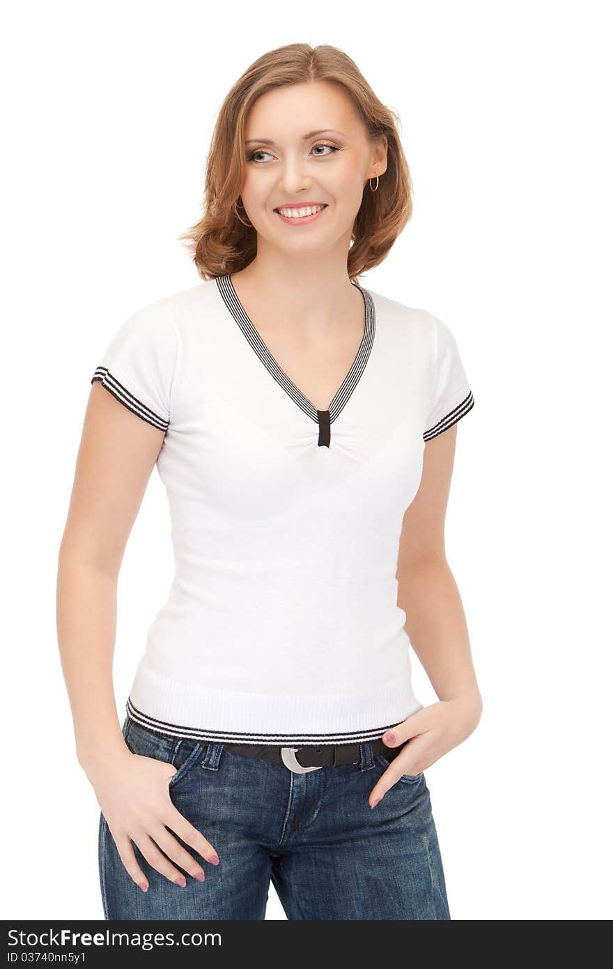 Portrait of attractive smiling woman in white blouse and jeans isolated on white