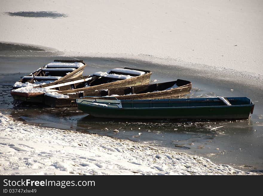 Fishing boats on frozen water