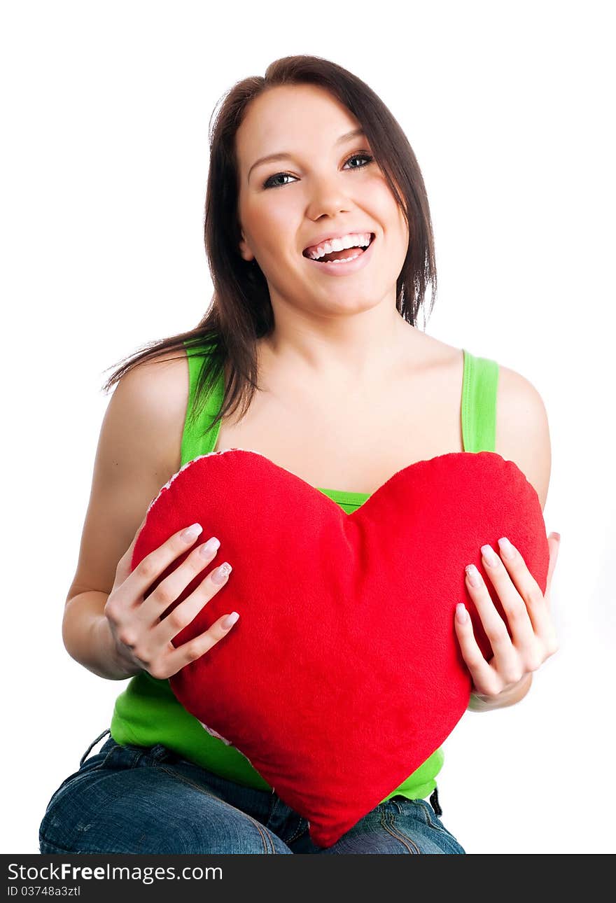 Young brunette with red hearts isolated