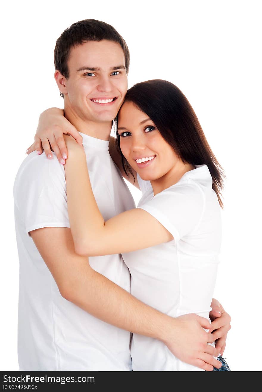 Beautiful young couple on a white background