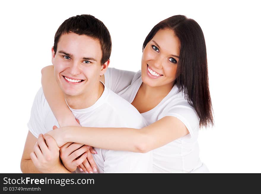 Beautiful young couple on a white background