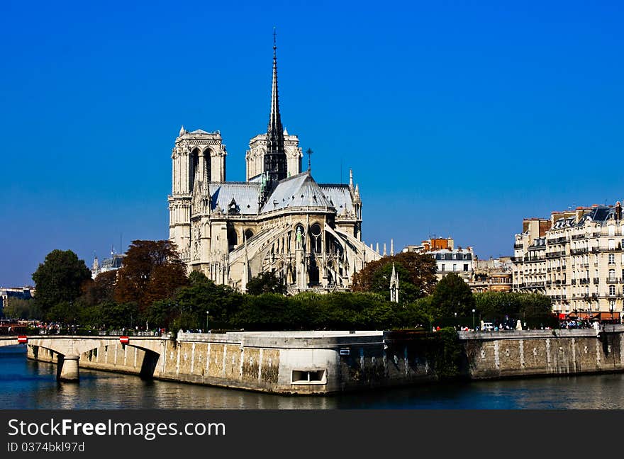 Notre Dame in Paris on a September day with a flawless blue sky. Notre Dame in Paris on a September day with a flawless blue sky.