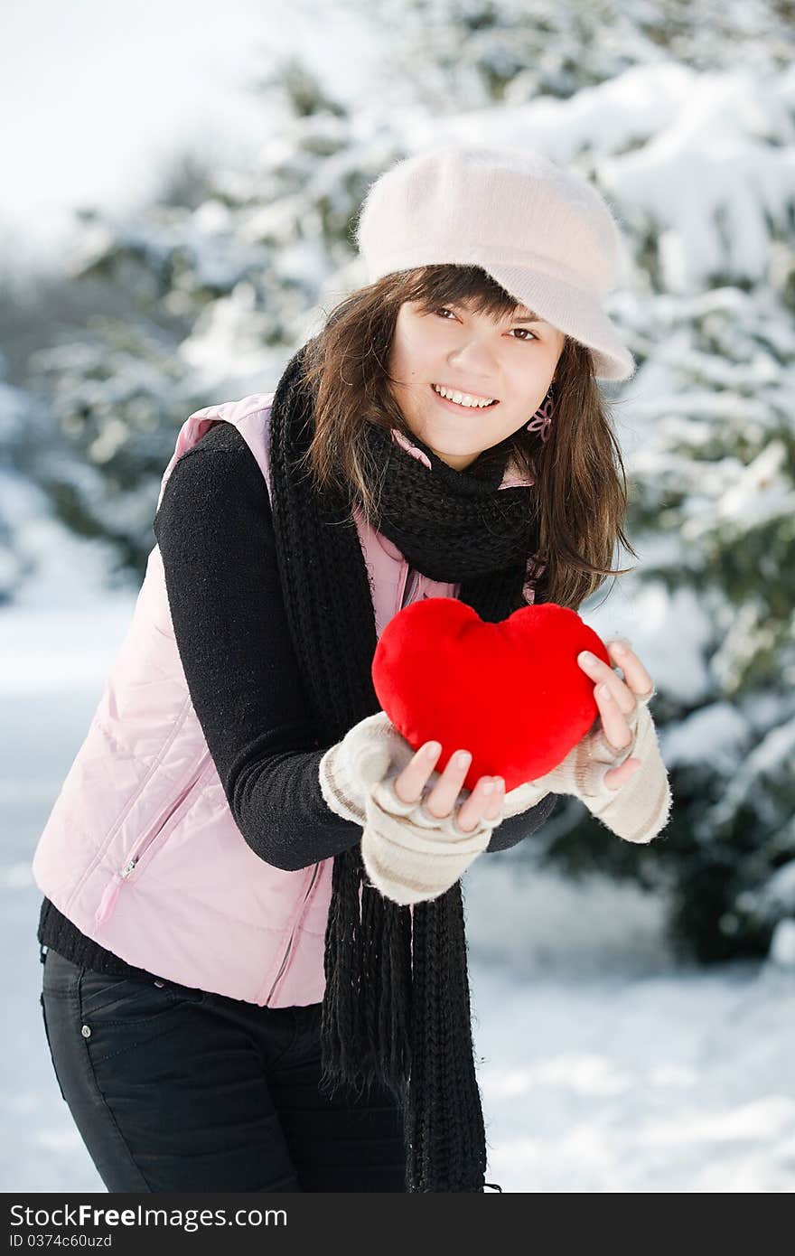 Teen girl heart in his hands