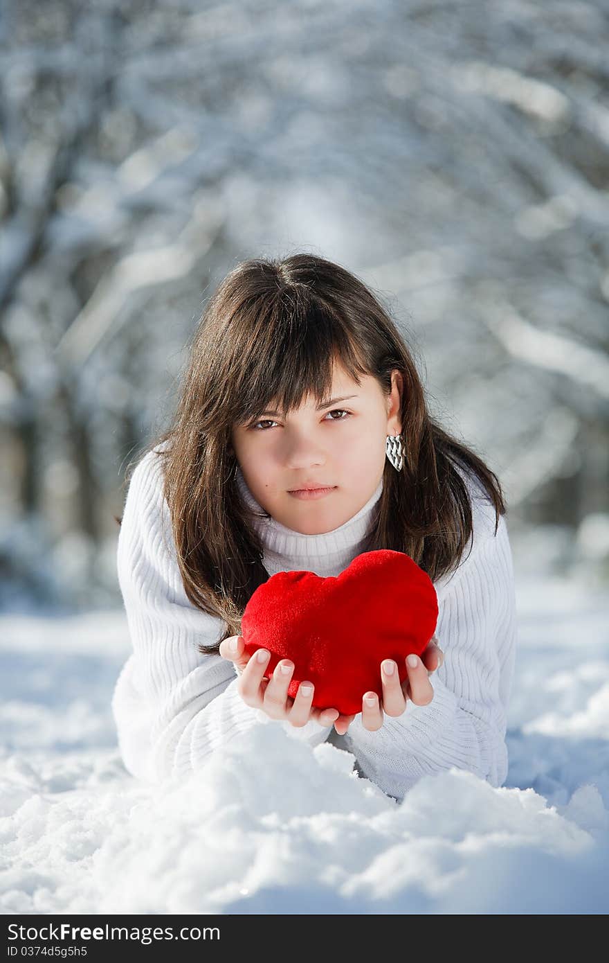 Teen girl heart in his hands