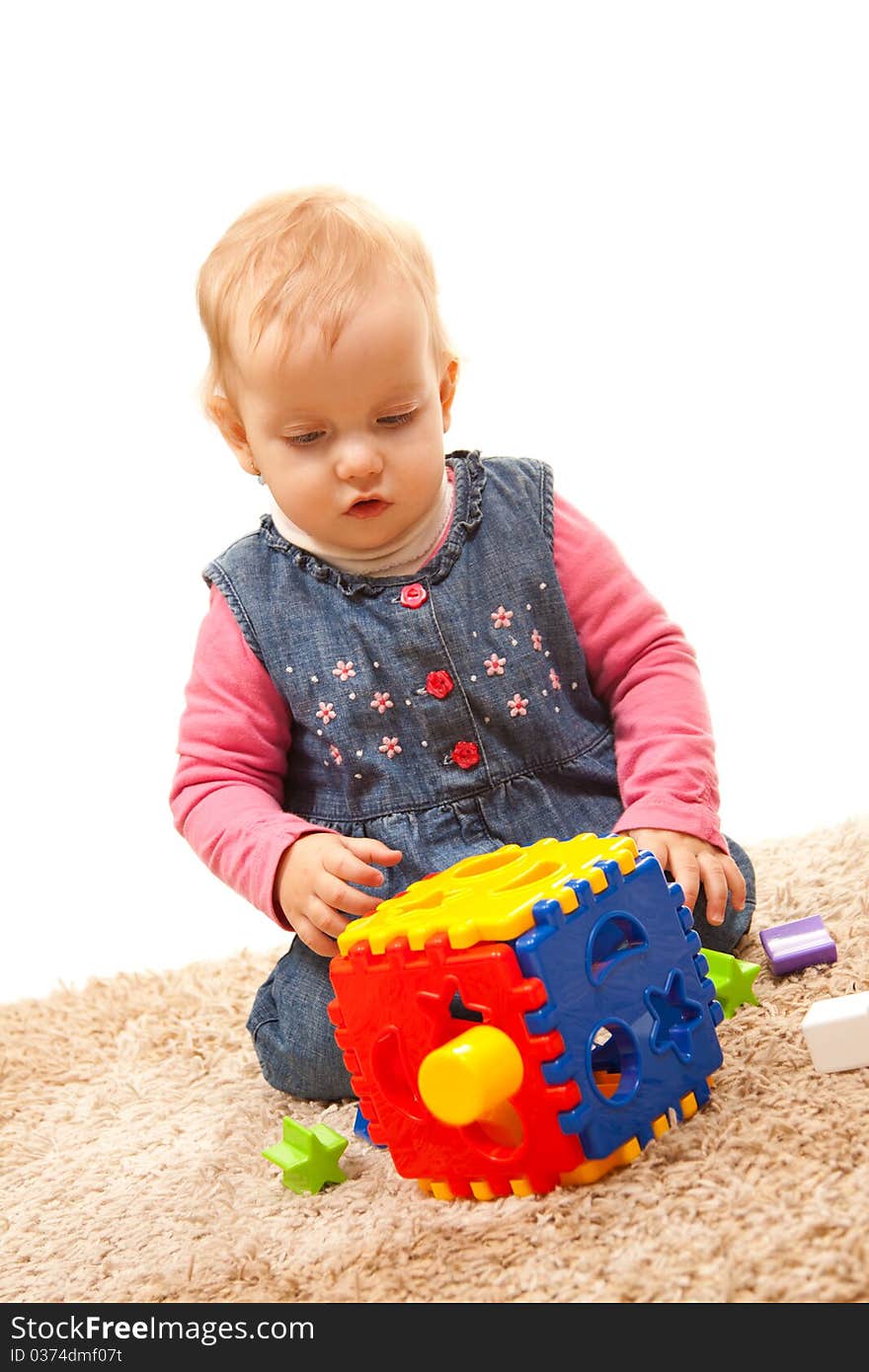 Little cute baby playing on the floor. Little cute baby playing on the floor