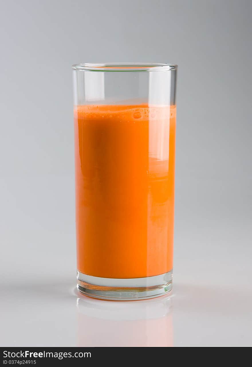 Carroty juice in the glass