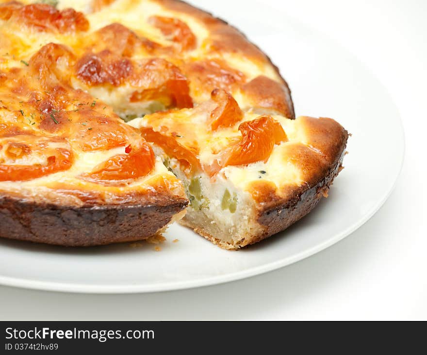 Sliced quiche on a plate. Sliced quiche on a plate