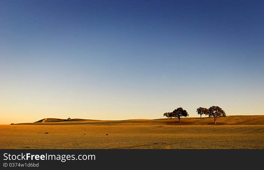 A Hay field at sunset. A Hay field at sunset.