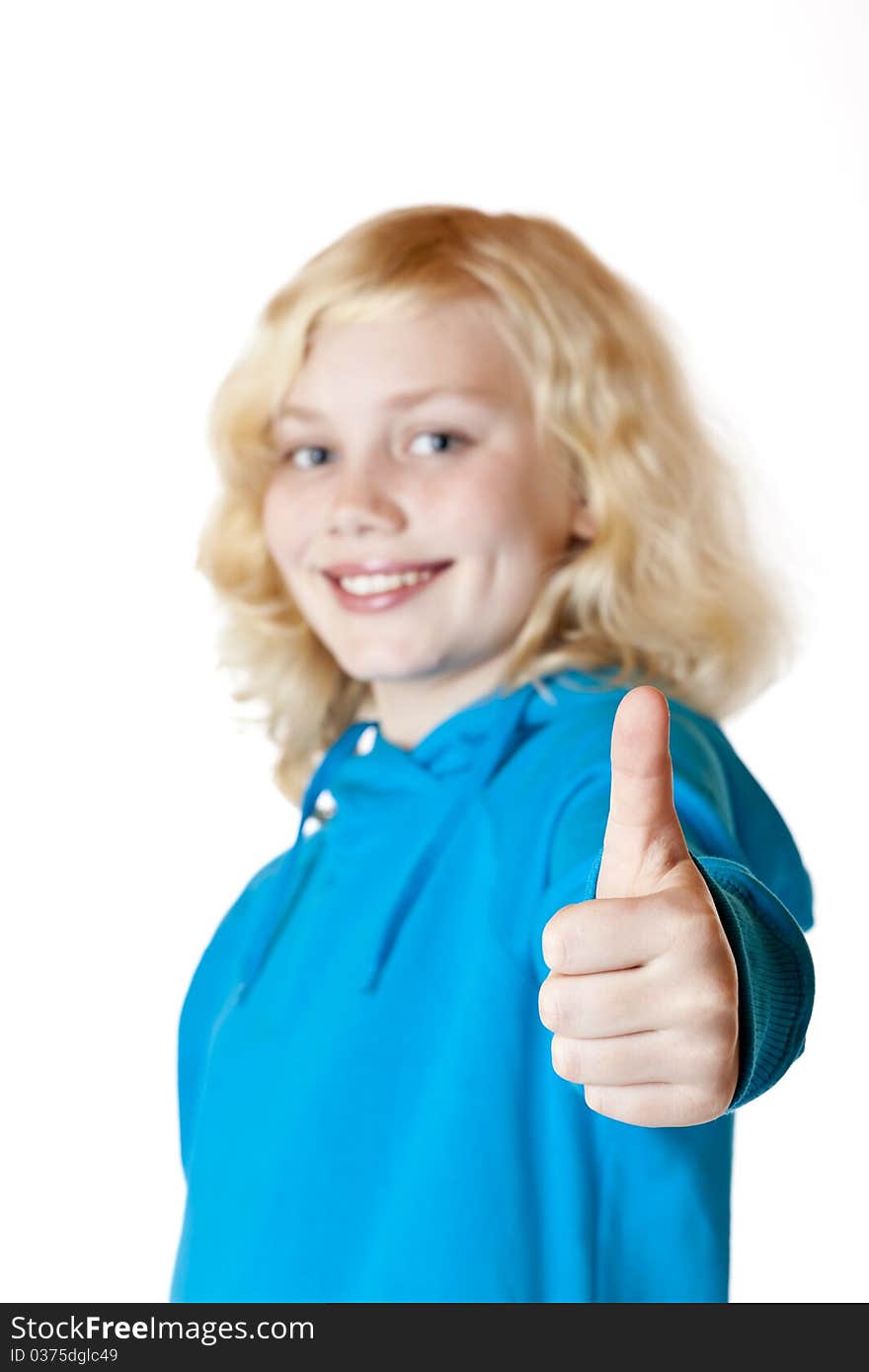 Young beautiful girl / child shows thumb up. Isolated on white background.