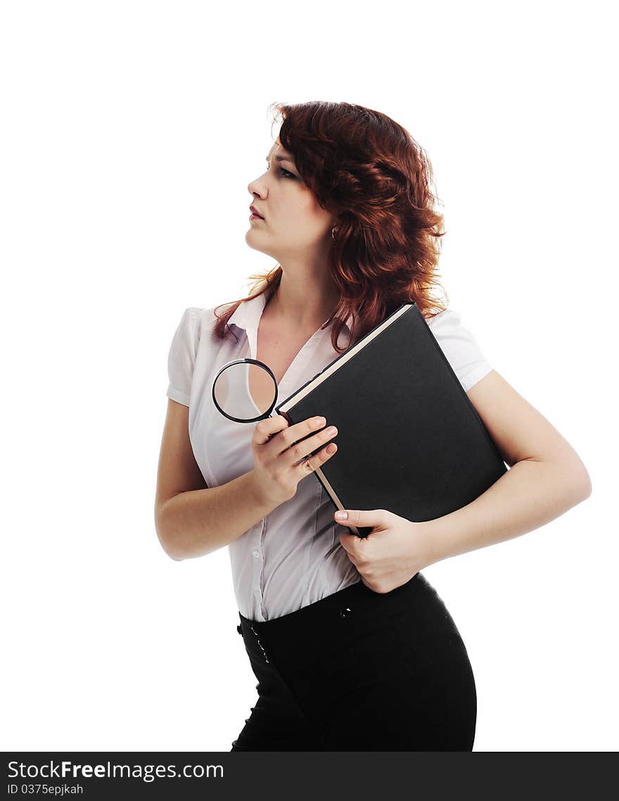 A nice woman with magnifying glass and a book. A nice woman with magnifying glass and a book