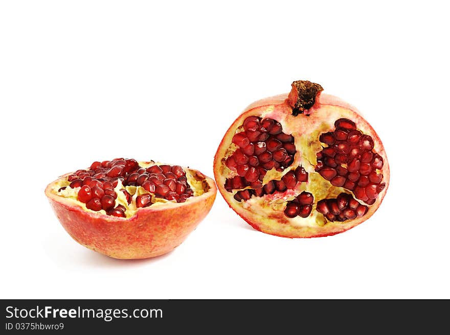 An image of a pomegranate fruit on white background