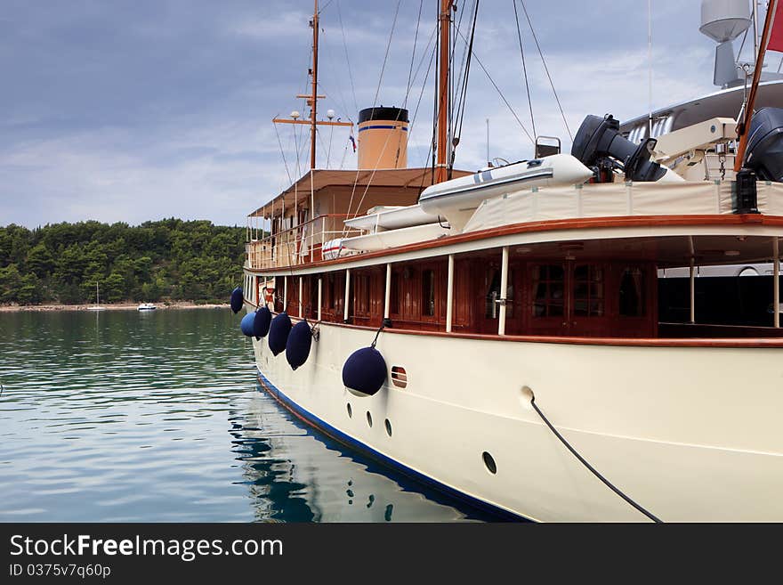 Old fashioned retro steam boat at dock. Old fashioned retro steam boat at dock